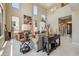 Light-filled living room features high ceilings, large windows and comfortable seating at 27892 N 108Th Way, Scottsdale, AZ 85262