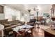 Open-concept living room with a fireplace and natural light with a view of the backyard at 2944 W Northern Ave, Phoenix, AZ 85051
