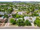 Extensive aerial view displaying the neighborhood and surrounding landscape at 302 E Orange Dr, Phoenix, AZ 85012