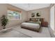 Cozy bedroom with modern decor, a large window and natural light, providing a comfortable retreat at 302 E Orange Dr, Phoenix, AZ 85012