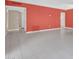 Spacious living room featuring tile flooring, and access to multiple rooms at 302 E Orange Dr, Phoenix, AZ 85012