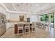 Elegant kitchen featuring a center island, stainless steel appliances, and an adjacent dining area at 30406 N 54Th St, Cave Creek, AZ 85331