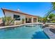 Beautiful backyard oasis with a sparkling swimming pool and spa, perfect for relaxing and entertaining at 30406 N 54Th St, Cave Creek, AZ 85331