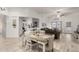 Charming dining area with a rustic table, leading into a comfortable living room space at 321 W Brooks St, Gilbert, AZ 85233