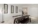 Dining room with a farmhouse table, bench seating, and decoratively framed mirrors at 321 W Brooks St, Gilbert, AZ 85233