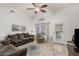 Inviting living room features a ceiling fan, plush seating, and decor that creates a cozy atmosphere at 321 W Brooks St, Gilbert, AZ 85233