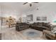 Open-concept living area flowing into a bright kitchen with a view of the dining space at 321 W Brooks St, Gilbert, AZ 85233