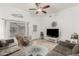 Bright and spacious living room with comfortable seating and a door that leads to the backyard at 321 W Brooks St, Gilbert, AZ 85233