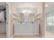 Bathroom with double vanity, subway tile backsplash, and a glass shower at 3514 E Desert Willow Rd, Phoenix, AZ 85044