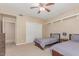 Bedroom with carpet, a ceiling fan, and two beds at 3514 E Desert Willow Rd, Phoenix, AZ 85044
