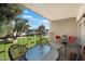 Large balcony with outdoor seating overlooking well-manicured grounds at 3737 E Turney Ave # 206, Phoenix, AZ 85018
