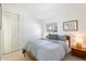 Bright bedroom with large closets, neutral decor, and a sunny window at 3737 E Turney Ave # 206, Phoenix, AZ 85018
