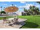 Community area with seating and mature landscaping offers a serene outdoor experience at 3737 E Turney Ave # 206, Phoenix, AZ 85018