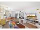 Open floor plan that seamlessly connects the living room, dining area, and kitchen at 3737 E Turney Ave # 206, Phoenix, AZ 85018