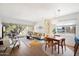 Bright living room with hardwood floors, a large window and dining table at 3737 E Turney Ave # 206, Phoenix, AZ 85018