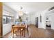 Open concept living room with bright lighting and a view of the kitchen at 3737 E Turney Ave # 206, Phoenix, AZ 85018