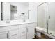 Bright bathroom featuring double sink vanity and tiled shower at 4063 E Amoroso Dr, Gilbert, AZ 85296
