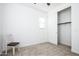 Bedroom featuring neutral carpet and a sliding door closet at 4063 E Amoroso Dr, Gilbert, AZ 85296
