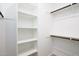 Walk in closet with built in shelving at 4063 E Amoroso Dr, Gilbert, AZ 85296