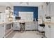 Bright home office featuring built-in storage lockers, drawers, cabinets, shelving, and a view from a window at 41138 N Soap Berry St, Queen Creek, AZ 85140