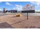 The Legacy Traditional School sign welcomes students and visitors with its red rock landscape at 41138 N Soap Berry St, Queen Creek, AZ 85140