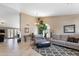 Bright living room featuring neutral walls, tile flooring, and large windows that fill the space with natural light at 420 N Leoma Ln, Chandler, AZ 85225