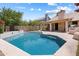 Inviting backyard pool with patio, ideal for relaxation and entertaining in a serene setting at 420 N Leoma Ln, Chandler, AZ 85225
