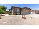 Well-kept home with a two-car garage, low-maintenance yard, and a neat, attractive appearance at 42347 W Bunker Dr, Maricopa, AZ 85138