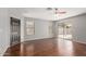 Open living space featuring stylish hardwood floors, plenty of natural light, and a modern design at 42347 W Bunker Dr, Maricopa, AZ 85138