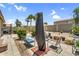 Backyard patio with desert landscaping, featuring a seating area for outdoor enjoyment and relaxation at 43787 W Colby Dr, Maricopa, AZ 85138