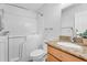 Accessible bathroom showcasing walk-in tub and vanity with granite countertop at 43787 W Colby Dr, Maricopa, AZ 85138