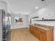 Open-concept dining room featuring natural light and direct access to the kitchen at 43787 W Colby Dr, Maricopa, AZ 85138