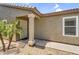 Inviting front porch with decorative security door, desert landscape, and a covered entry at 43787 W Colby Dr, Maricopa, AZ 85138
