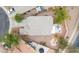 Aerial view showing the backyard featuring a fire pit area and patio with outdoor seating at 44890 W Desert Garden Rd, Maricopa, AZ 85139