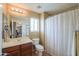 Bathroom with a sink, shower, and natural light at 44890 W Desert Garden Rd, Maricopa, AZ 85139