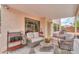 Charming covered patio with comfortable seating and decorative elements, perfect for relaxing at 44890 W Desert Garden Rd, Maricopa, AZ 85139