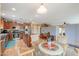 Open concept kitchen with stainless steel appliances, granite countertops, and a breakfast nook at 44890 W Desert Garden Rd, Maricopa, AZ 85139