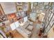 A bright living room filled with natural light, decorated with artwork, and comfortable seating at 44890 W Desert Garden Rd, Maricopa, AZ 85139