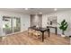 Bright dining area featuring sliding doors, modern lighting, and decor at 510 N Entrada St, Chandler, AZ 85226