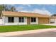 Charming single-story home with well-maintained lawn, light colored siding and trim at 510 N Entrada St, Chandler, AZ 85226