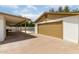 Exterior view of detached garage and carport, leading to the backyard pool area at 510 N Entrada St, Chandler, AZ 85226