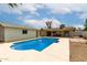 Beautiful backyard pool offering a refreshing oasis, adjacent to both the house and detached garage at 510 N Entrada St, Chandler, AZ 85226