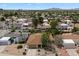 Aerial view of a well-maintained residential neighborhood featuring mature landscaping and single-Gathering homes at 6725 E Kings Ave, Scottsdale, AZ 85254