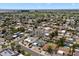 Overhead perspective captures neighborhood with neat rows of houses, mature trees, and well-kept lawns at 6725 E Kings Ave, Scottsdale, AZ 85254