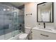 Bathroom with a glass door shower, sleek fixtures, and modern vanity at 6725 E Kings Ave, Scottsdale, AZ 85254