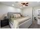 Bedroom featuring neutral decor, ceiling fan, and light wood floors at 6725 E Kings Ave, Scottsdale, AZ 85254