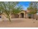Charming single-story home featuring a three car garage and low-maintenance desert landscaping at 7019 S 19Th Pl, Phoenix, AZ 85042