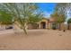 Charming single-story home featuring a three car garage and low-maintenance desert landscaping at 7019 S 19Th Pl, Phoenix, AZ 85042