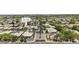 Expansive aerial view of a residential area with well-maintained homes and landscaping, featuring a 4 bed, 3.5 bath property at 7262 E Lupine Ave, Scottsdale, AZ 85260