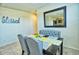 Inviting dining room with seating for four, stylish chairs, and a bright airy feel at 7751 W Miami St, Phoenix, AZ 85043
